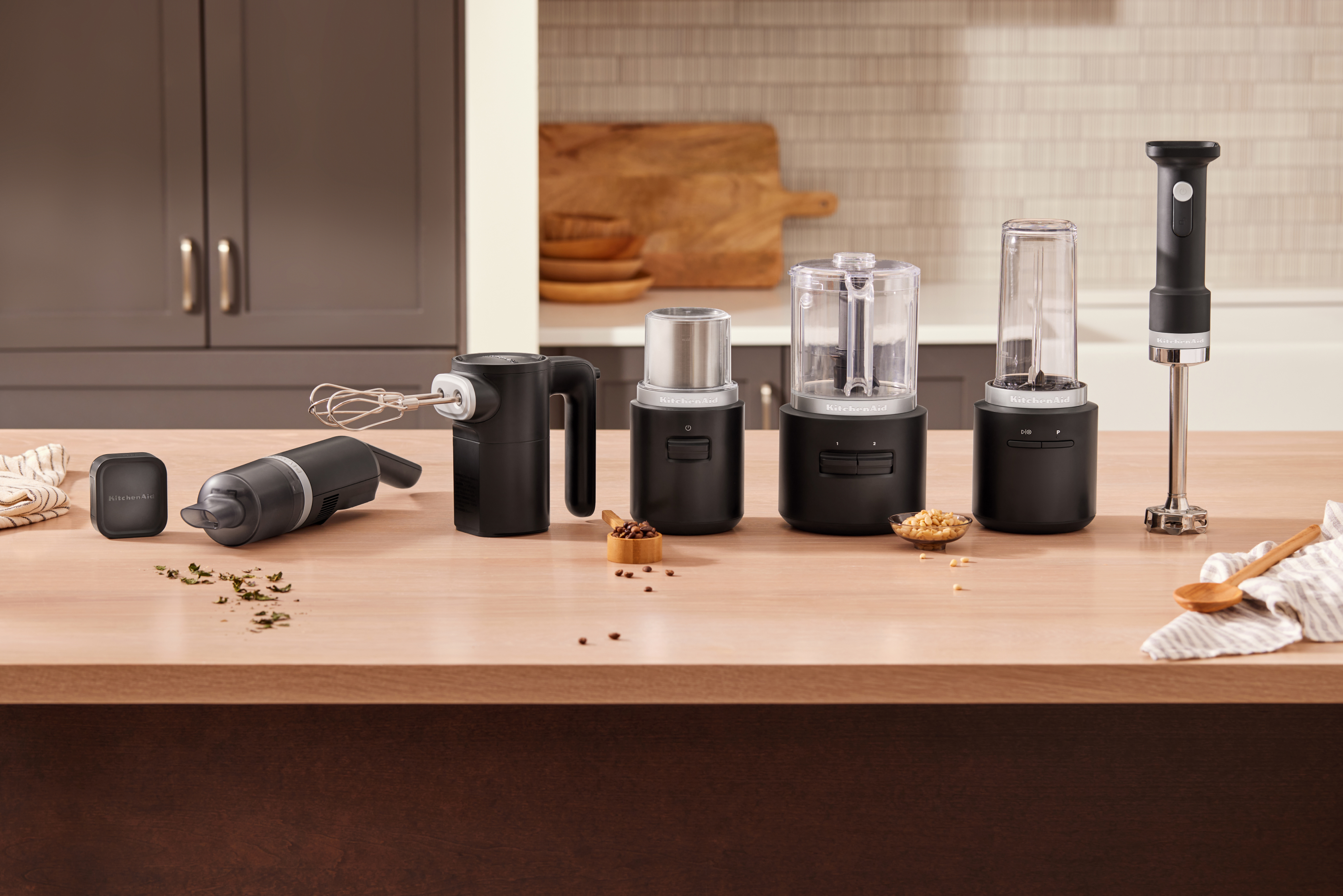 KitchenAid Go™ Cordless appliances lined up on a countertop.