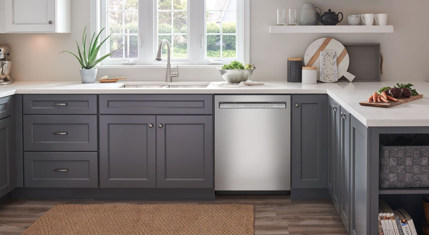 Stainless steel KitchenAid® dishwasher in a modern kitchen Stainless steel KitchenAid® dishwasher in a modern kitchen