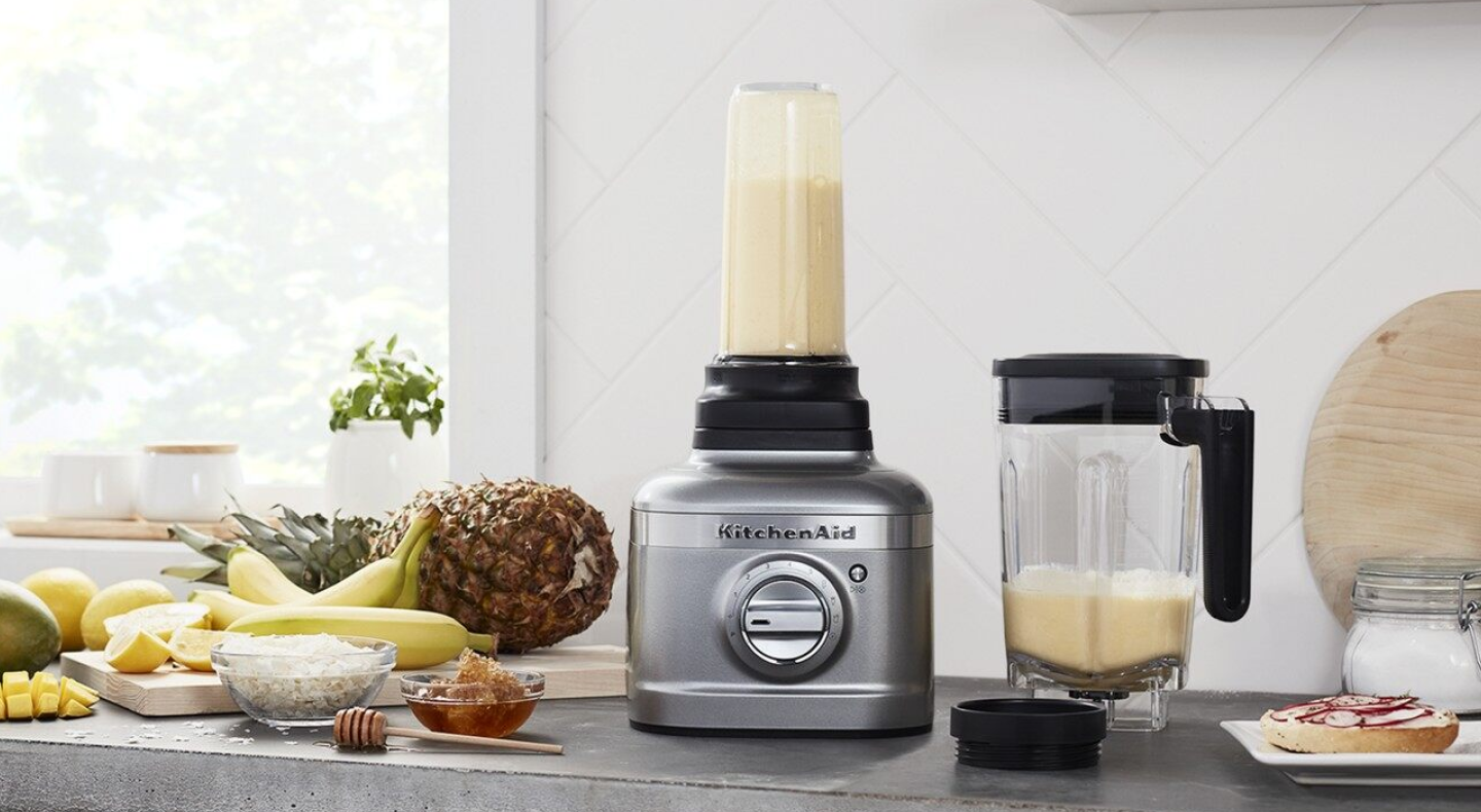 Same as Image Alt Text Silver KitchenAid® personal blender on counter with ingredients