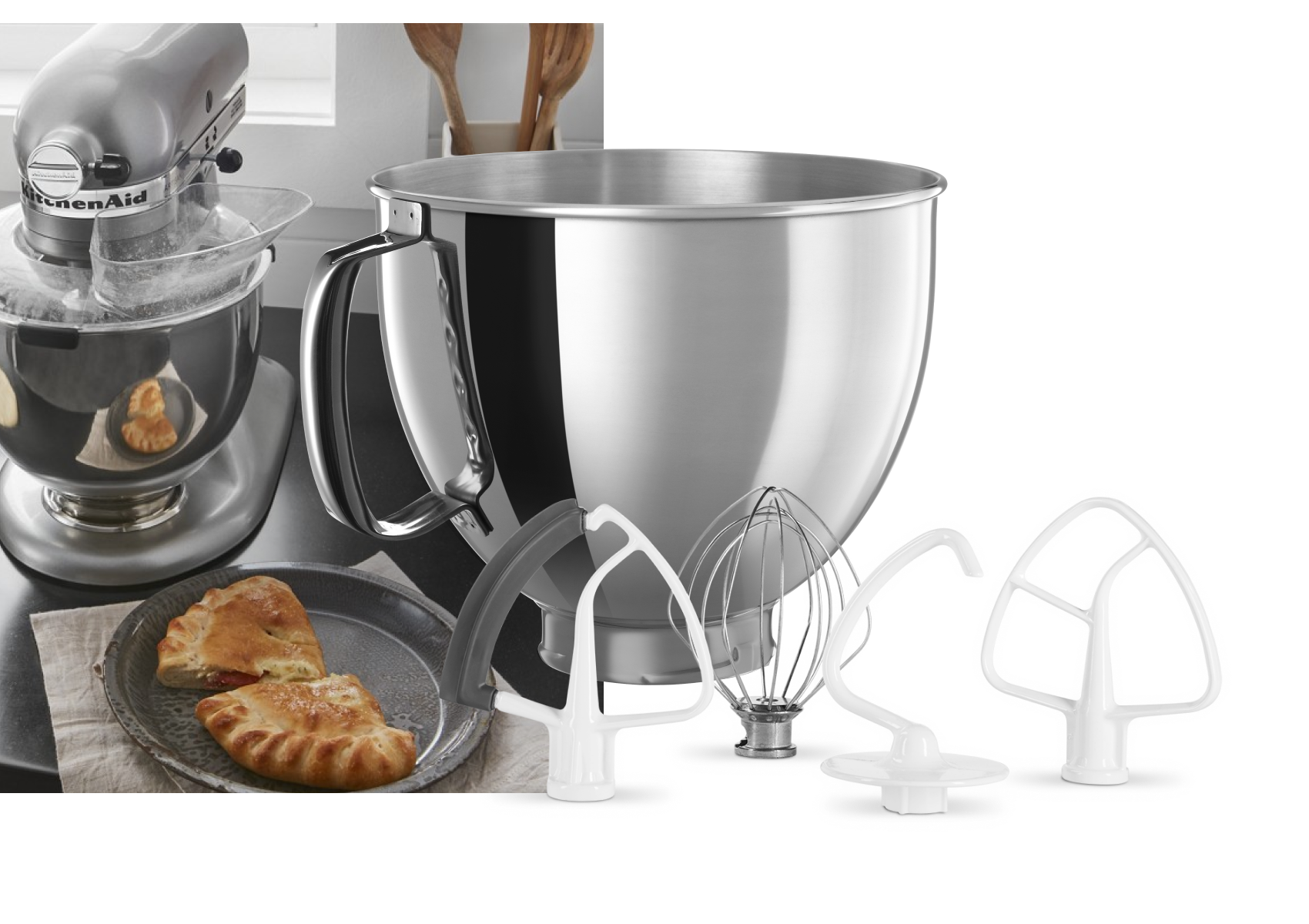 A stainless steel bowl, edge beater, whip, dough hook, flat beater, spiral hook and pastry beater.