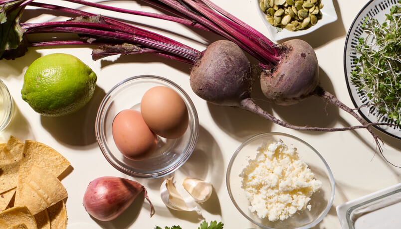 Beetroots and other ingredients on a table.