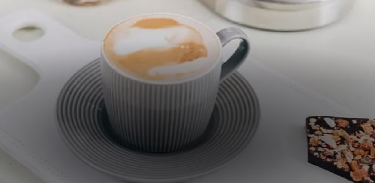 A latte on a countertop.