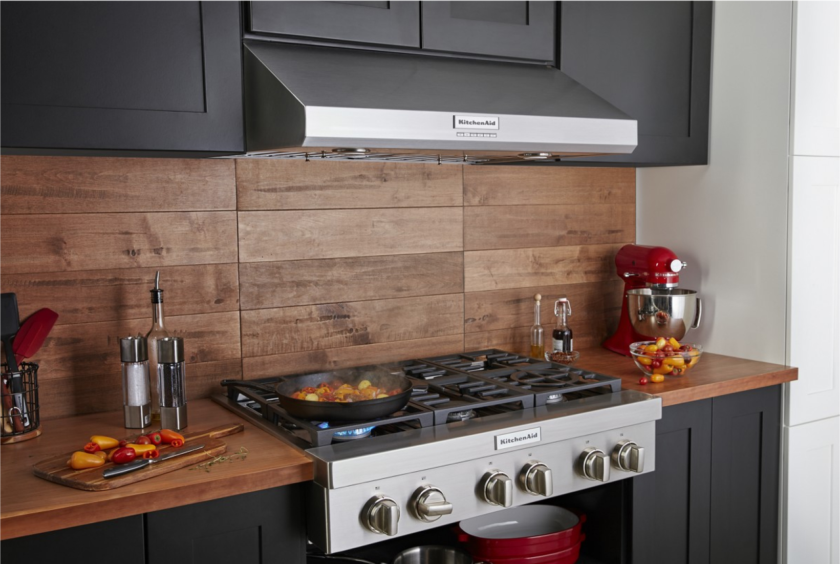 A KitchenAid® over-the-range hood installed over a KitchenAid® range.