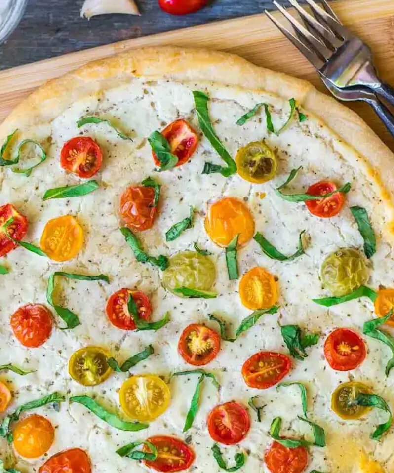 A tomato and basil pizza.