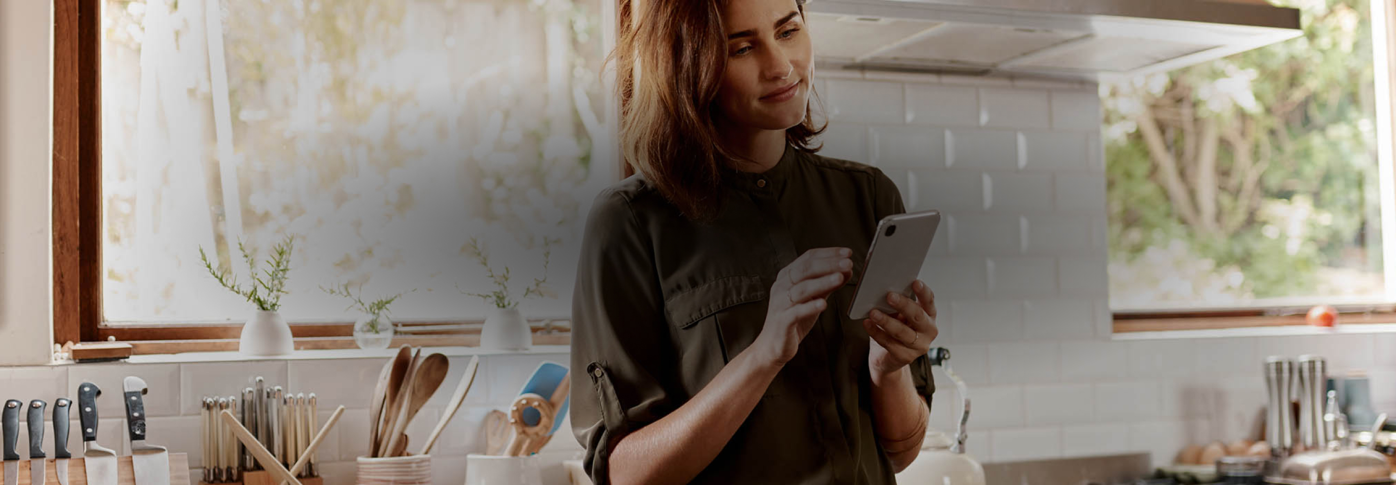 A person using a smart phone.