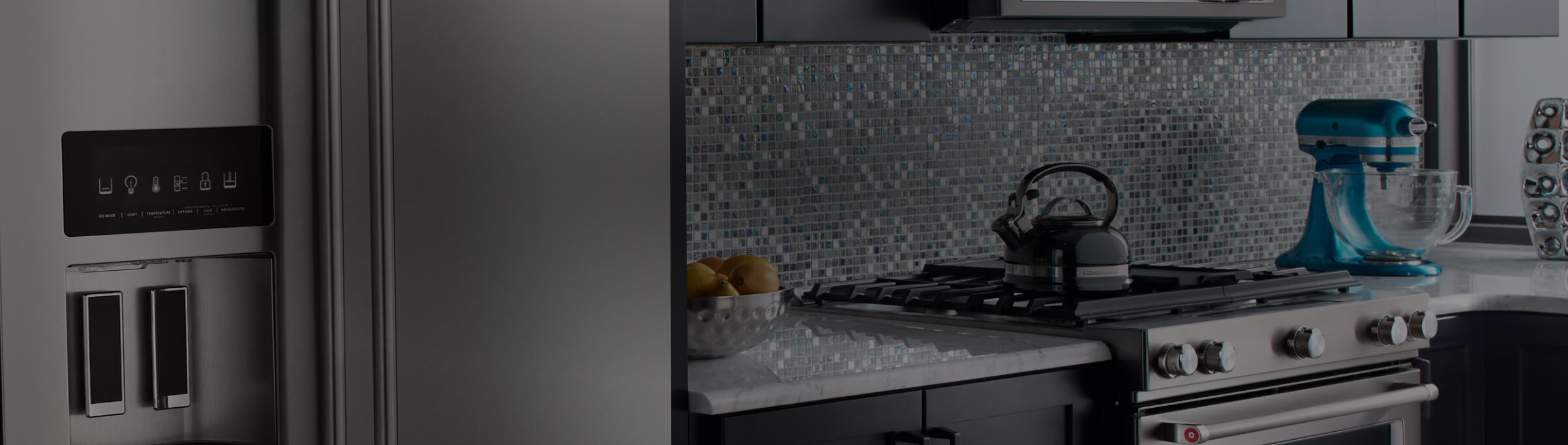 Kitchen set shot with KitchenAid slide-in range and blue KitchenAid Stand Mixer.