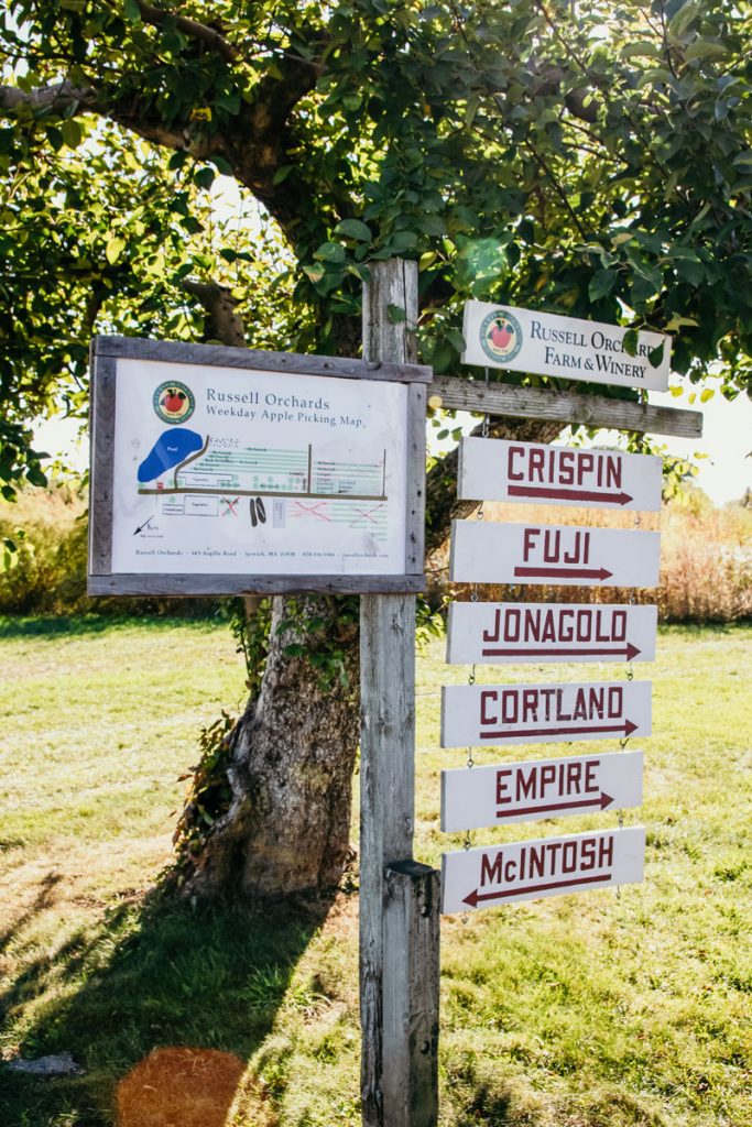 A sign with the variety of apples at Russell Orchard.