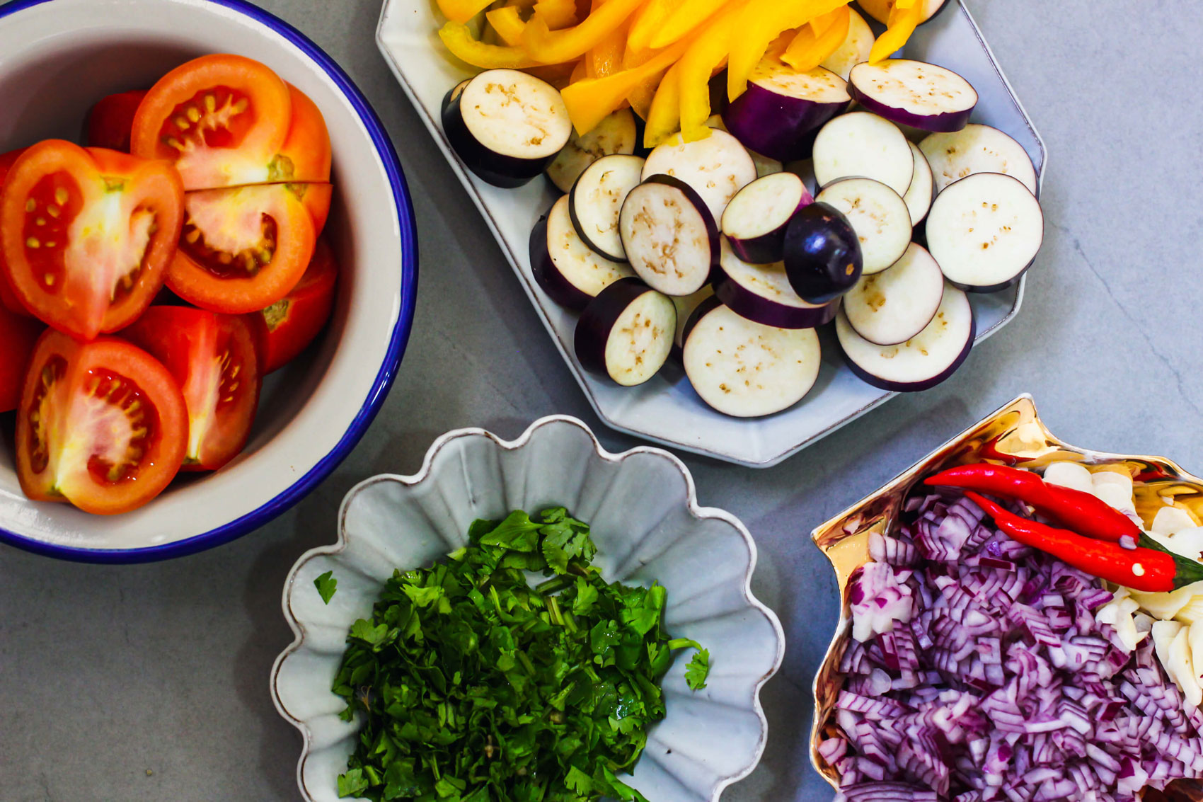 The ingredients for Spicy Clam Pasta in separate bowls and dishes.
