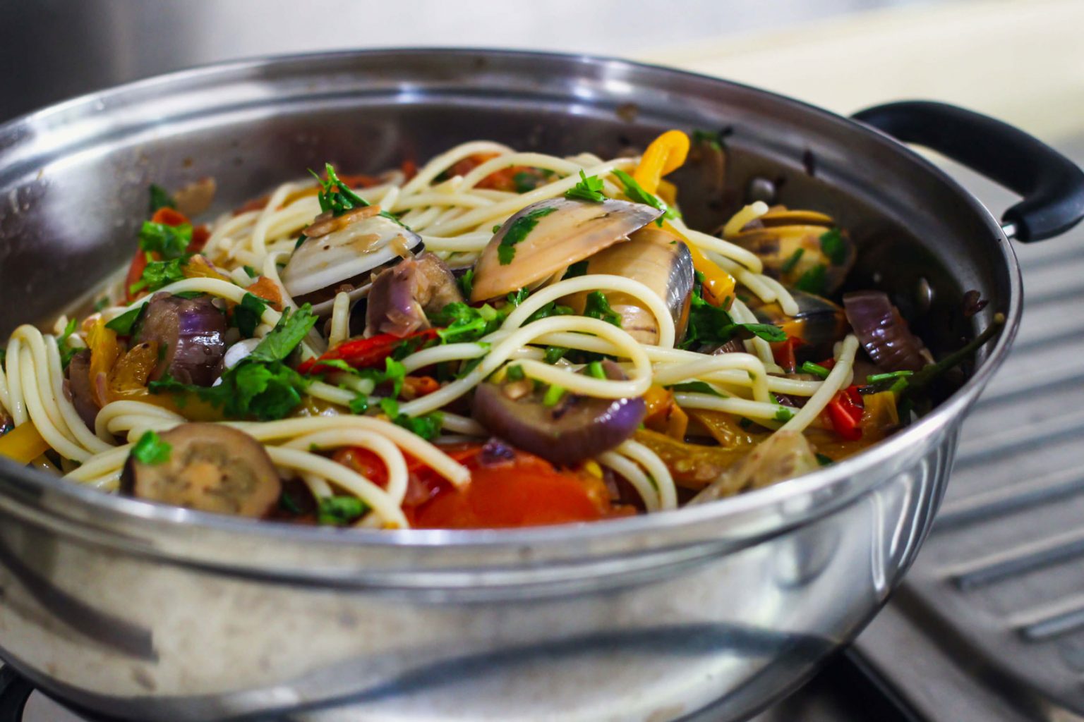Freshly made Spicy Clam Pasta in a large pot.