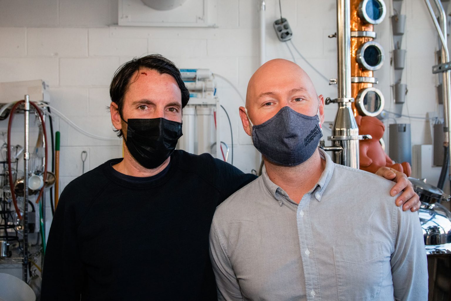 Aaron Sing Fox and Daniel de la Nuez posing for a photo.