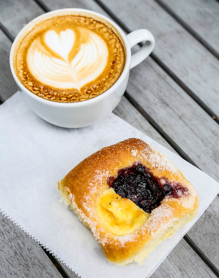 A latte and a sweet kolache.