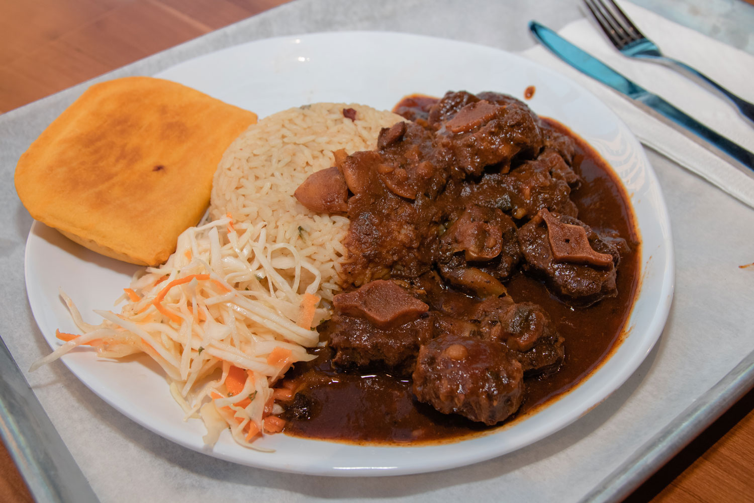A plate of hearty, delicious Jamaican food.