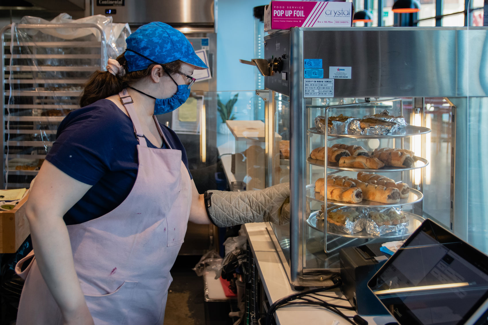 A person tending to the desserts of Pie's the Limit.