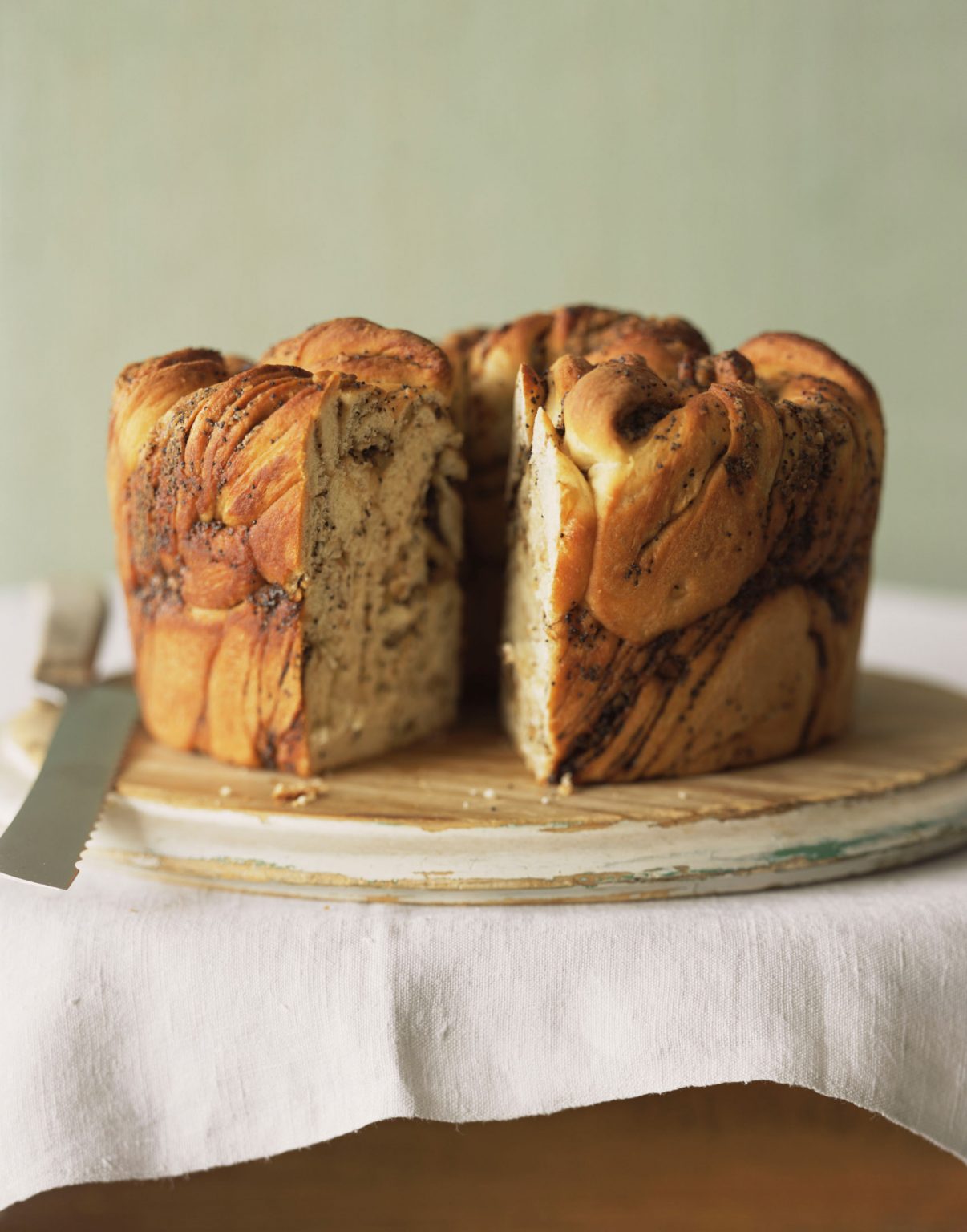 Poppy seed babka bread, minus a single perfectly cut slice.