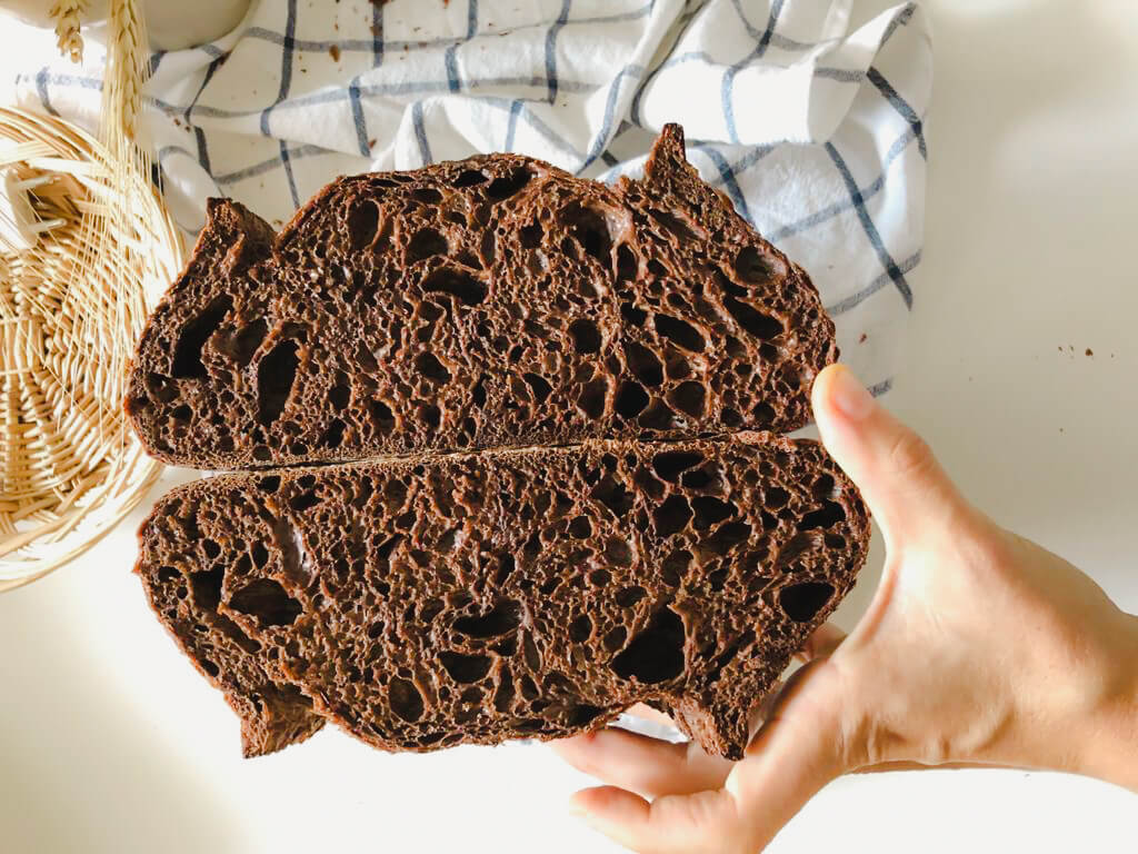 A loaf of bread split right down the middle.