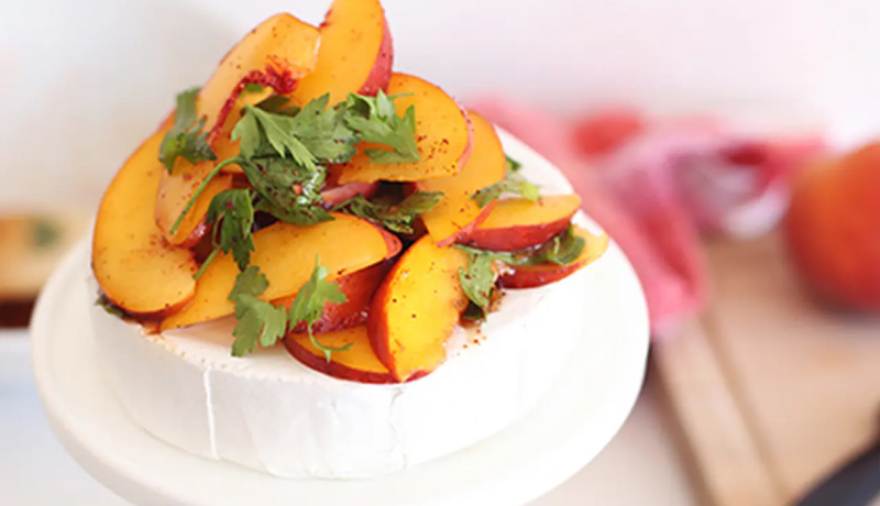 Baked Brie “Cake” with Chili Infused Peach Topping