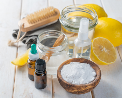 Bowl of salt, slices of lemons and spray bottles