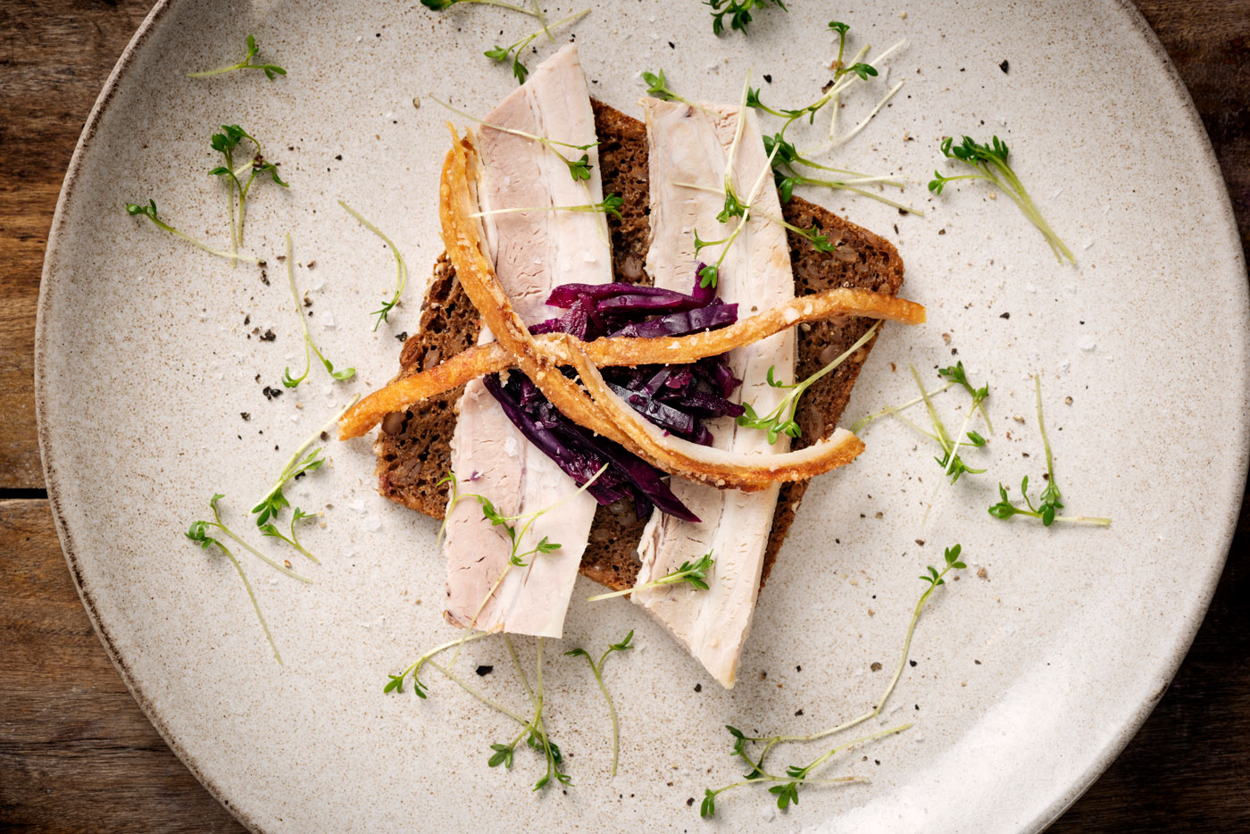 A plated Danish open-faced sandwich.