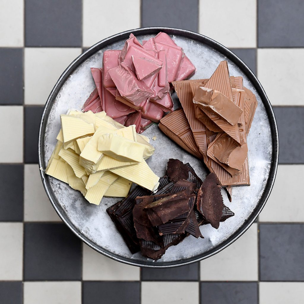 The four different types of chocolate: dark, milk, white and ruby.