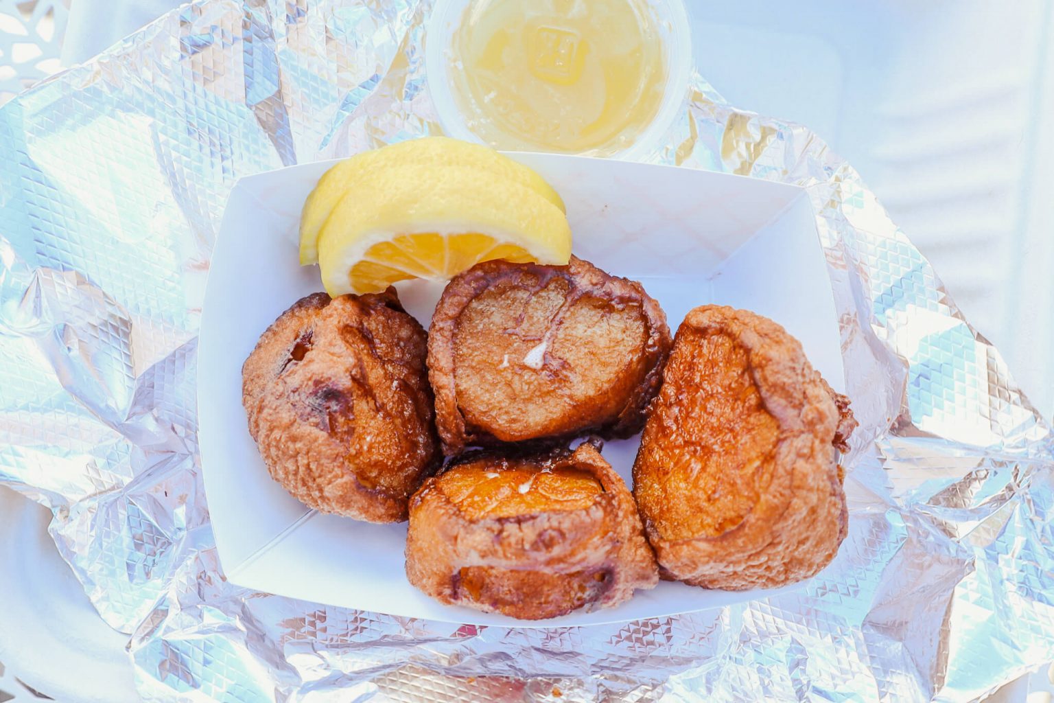 A basket of fried scallops.