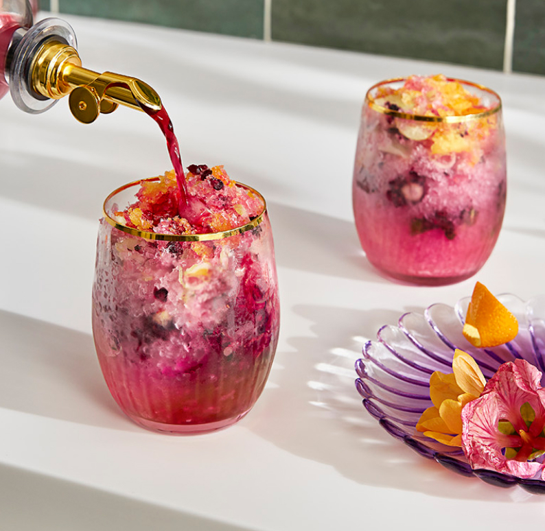 A set of three Hibiscus cocktails.