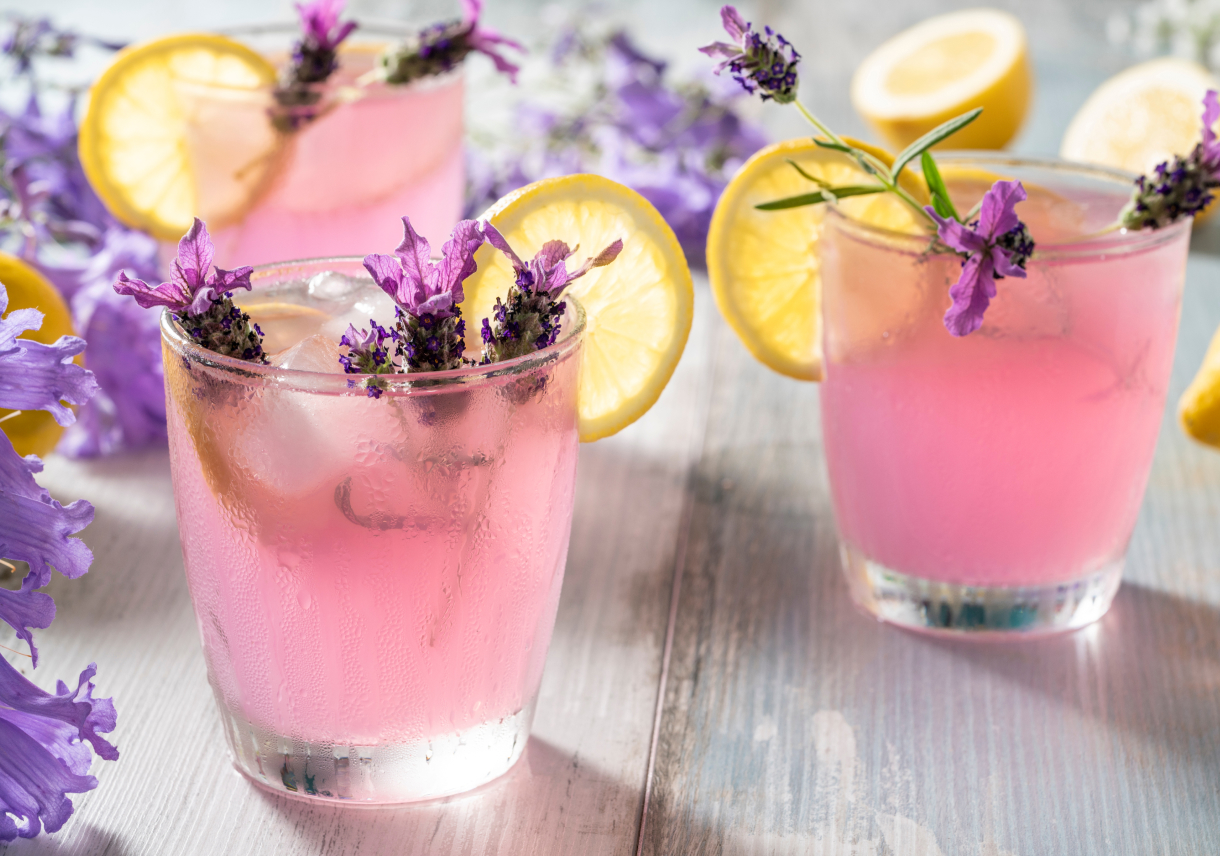 A set of three lavender lemon cocktails.