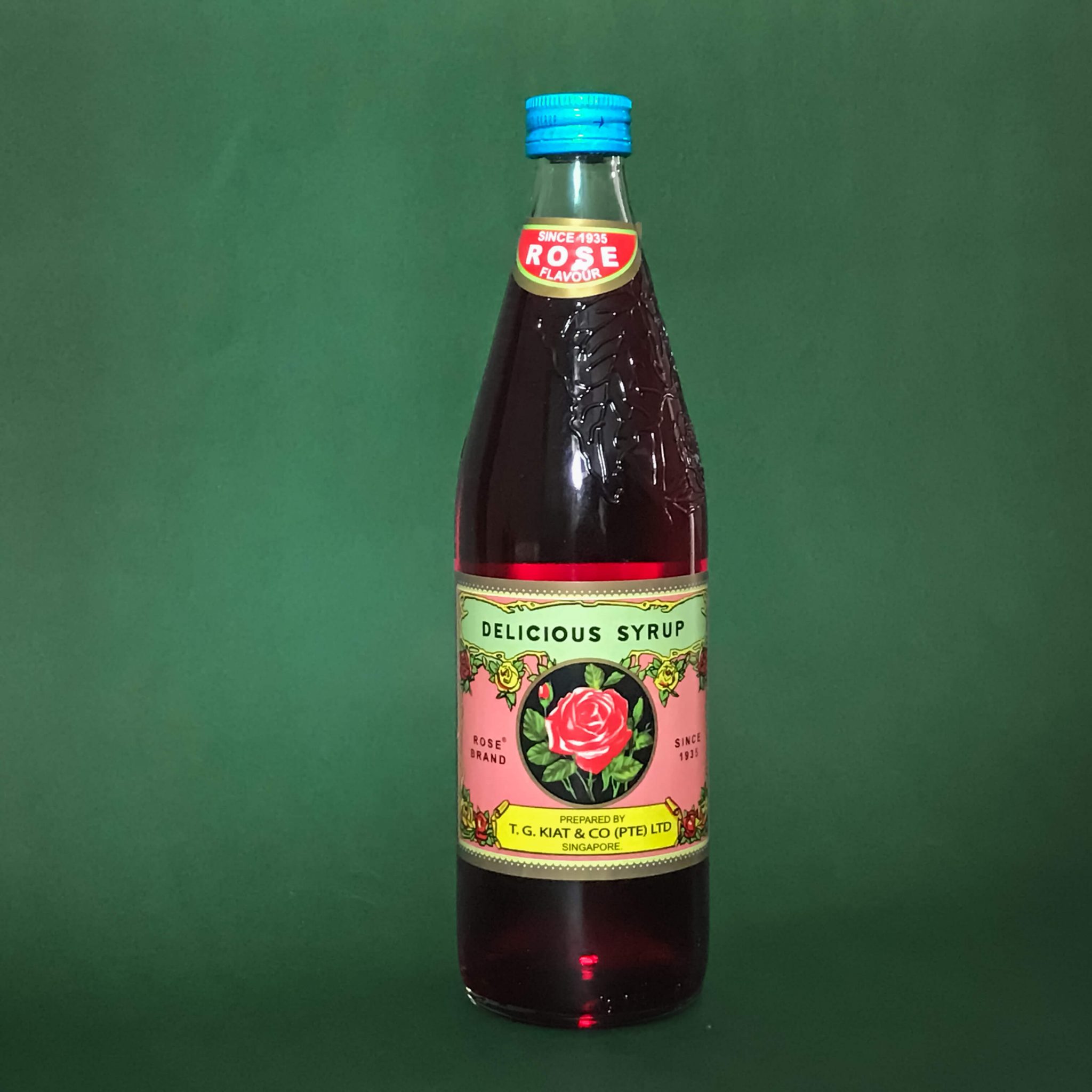 A bottle of Rose Brand Rose Syrup.