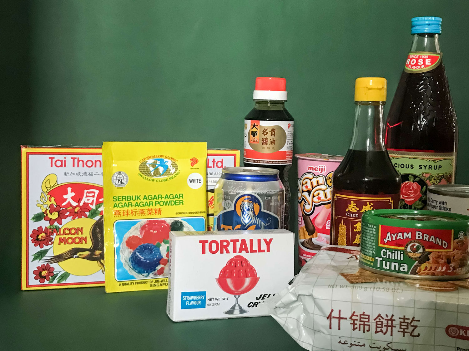 A variety of Singaporean packaged foods, condiments and drinks.