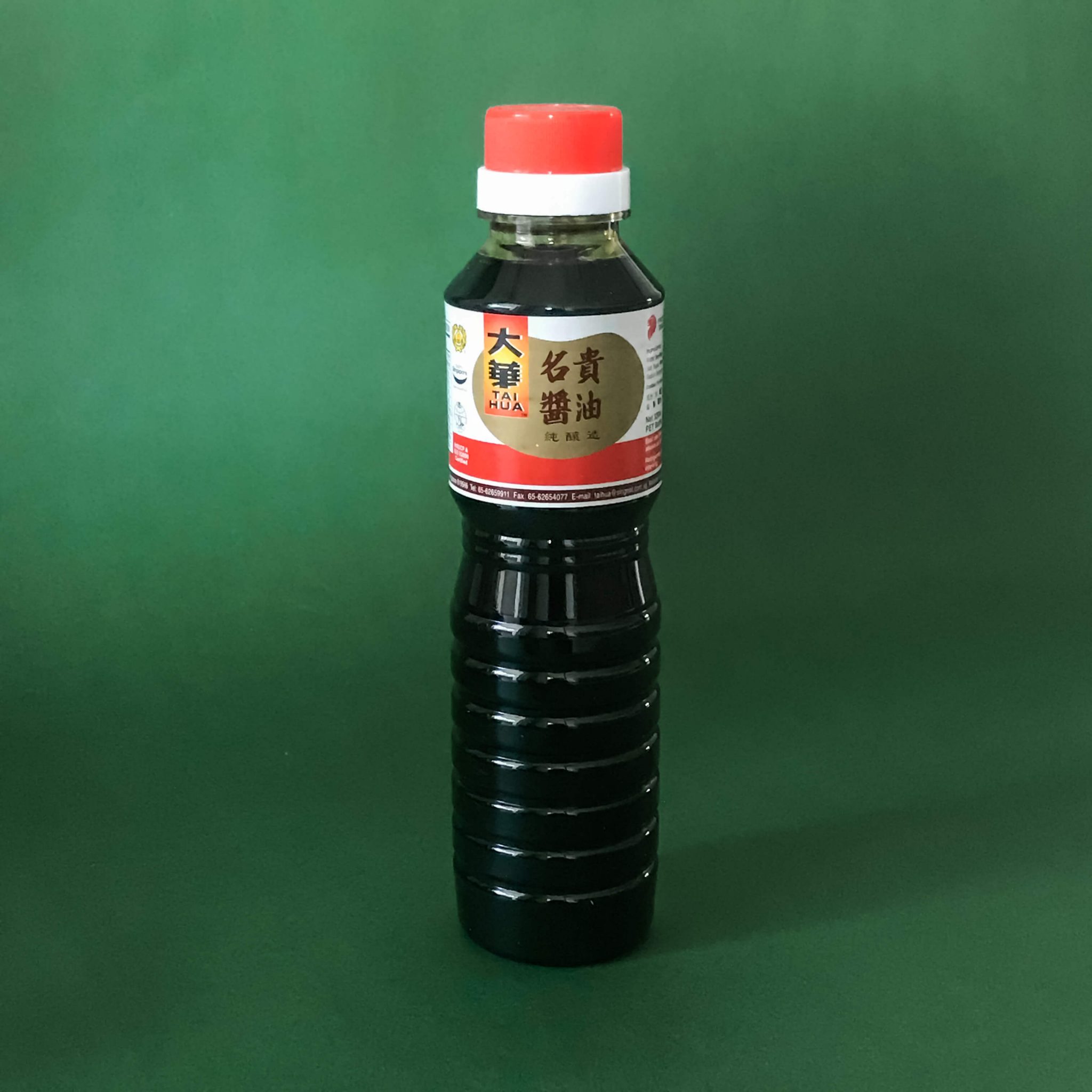 A tall bottle of Tai Hua Superior Dark Soy Sauce.