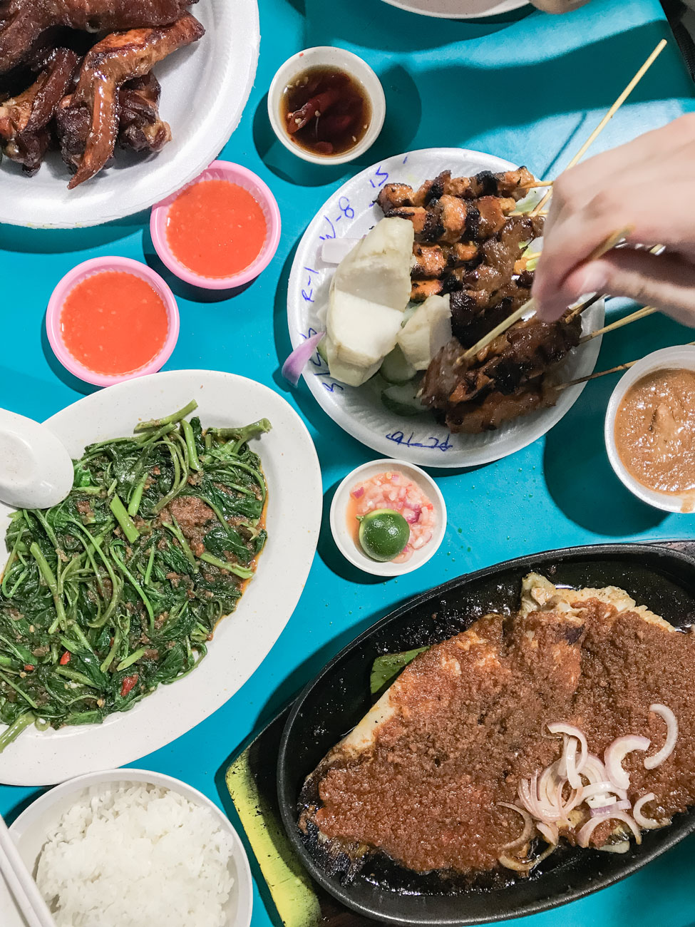 A variety of Asian dishes resting on a table.