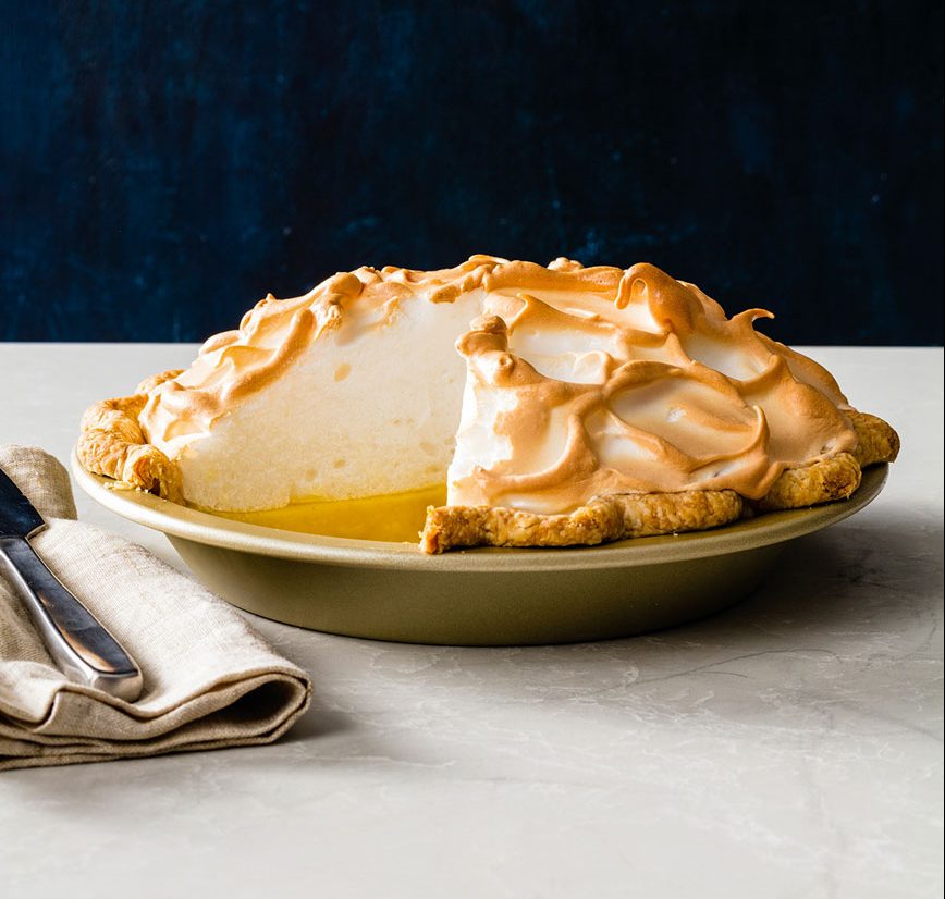 A pie with a single slice cut out.