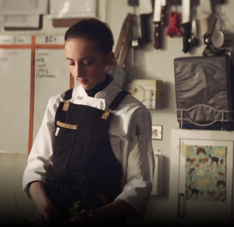 Karyn Tomlinson prepping herbs.