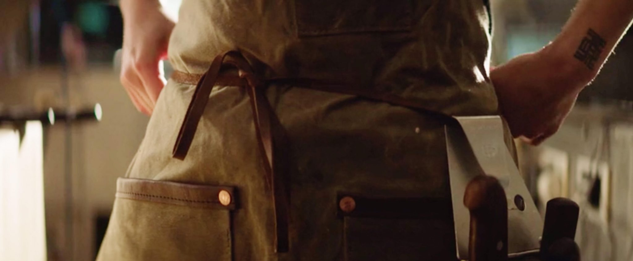 Karyn Tomlinson tightly securing her apron.