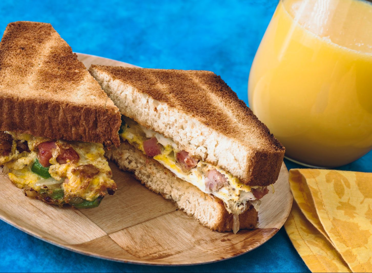 A Denver sandwich cut cleanly in half.