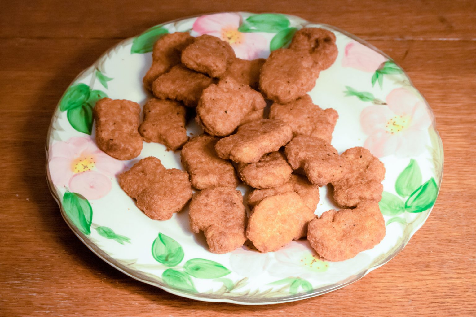 A delicate plate filled with Nuggs' plant-based nuggets.