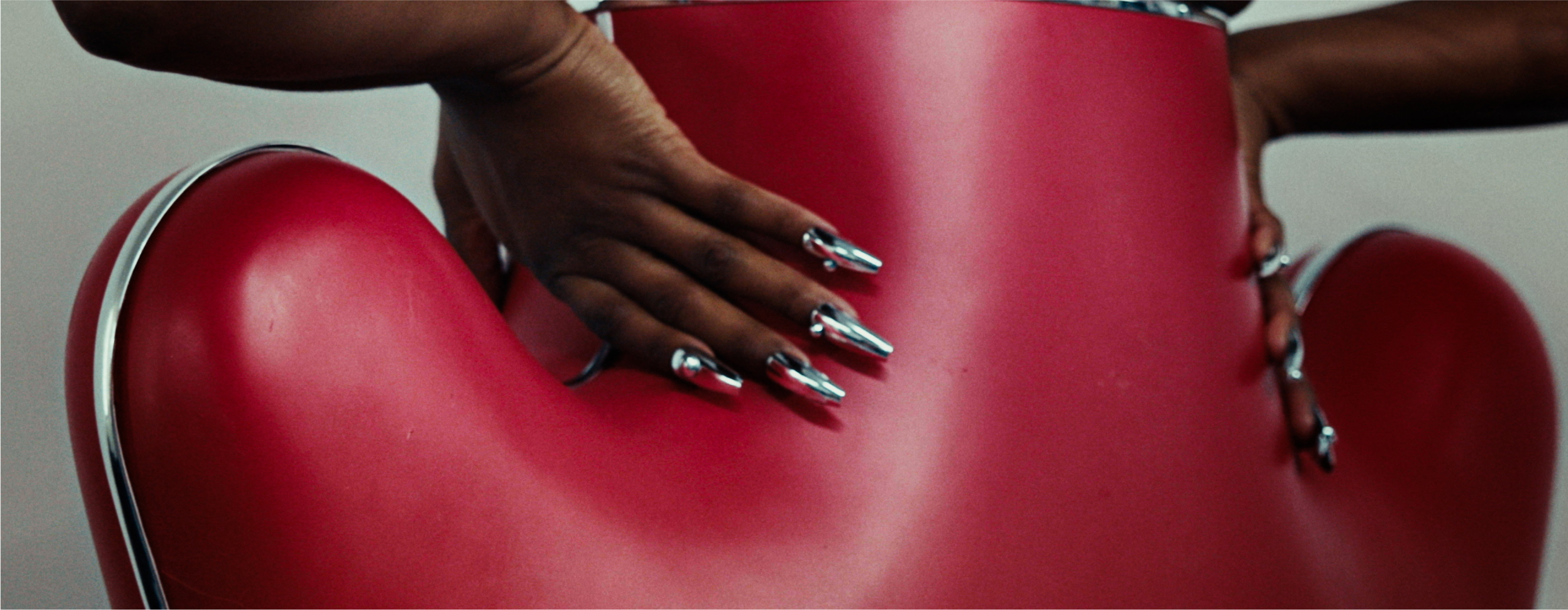 A close up of corseted details on a Hibiscus Collection look.