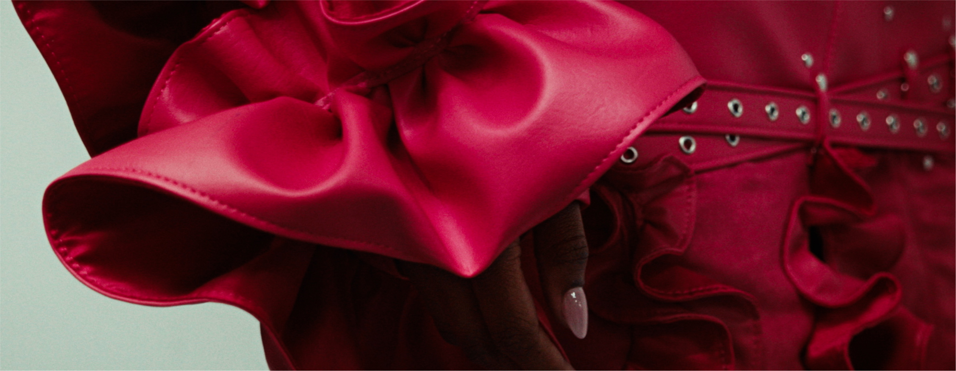 A close up of the ruffled edges of a Hibiscus Collection look.