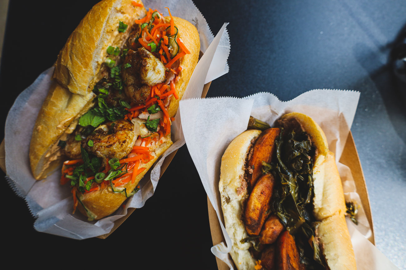 Two po'boy sandwiches.