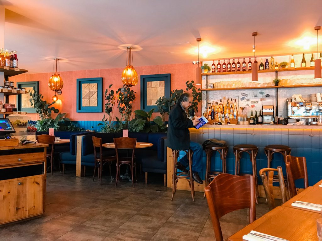 A gentleman waiting to order a crepe.