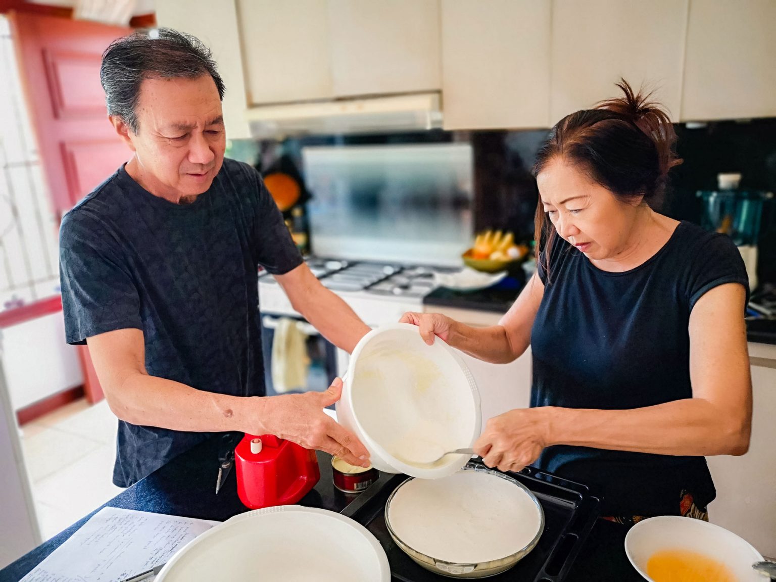 A family prepping food together.