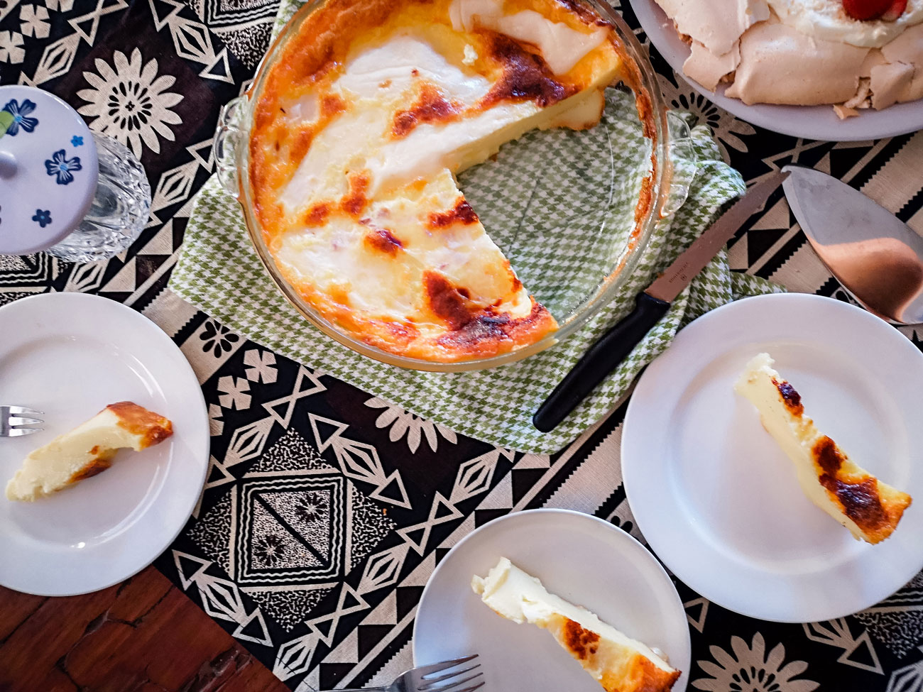 A sliced Indonesian dish resting on a table.