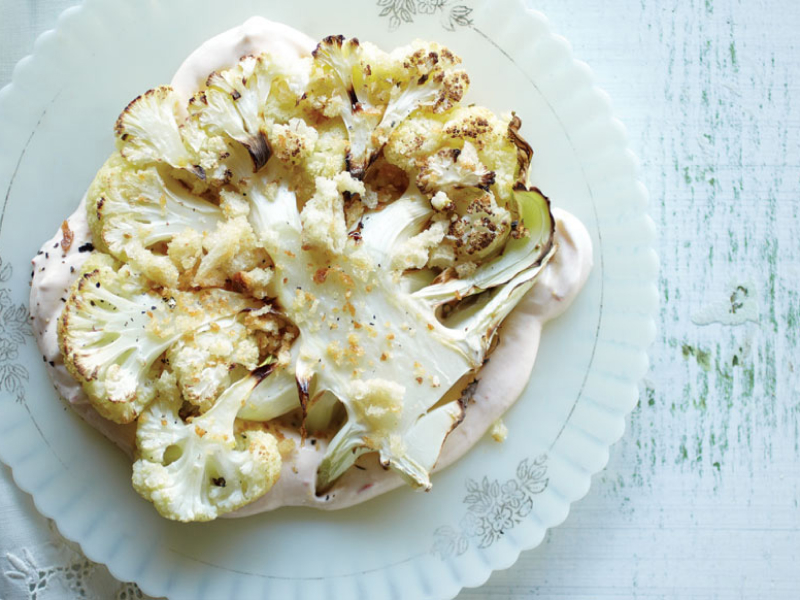 Cooked cauliflower on a serving dish.