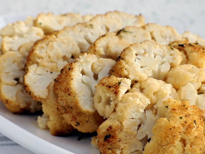 A serving dish of cauliflower rice. A serving dish of cauliflower rice.