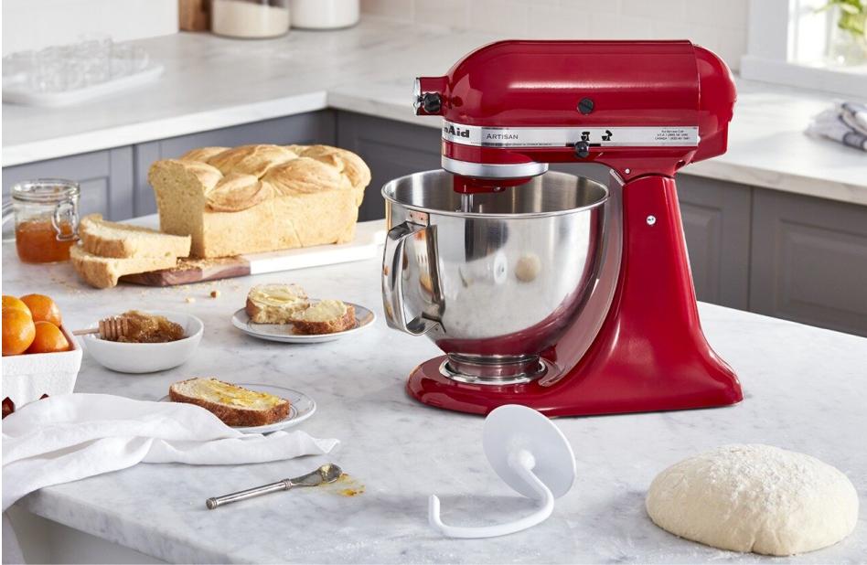 KitchenAid® stand mixer on countertop with dough hook, bread dough and homemade bread. KitchenAid® stand mixer on countertop with dough hook, bread dough and homemade bread.