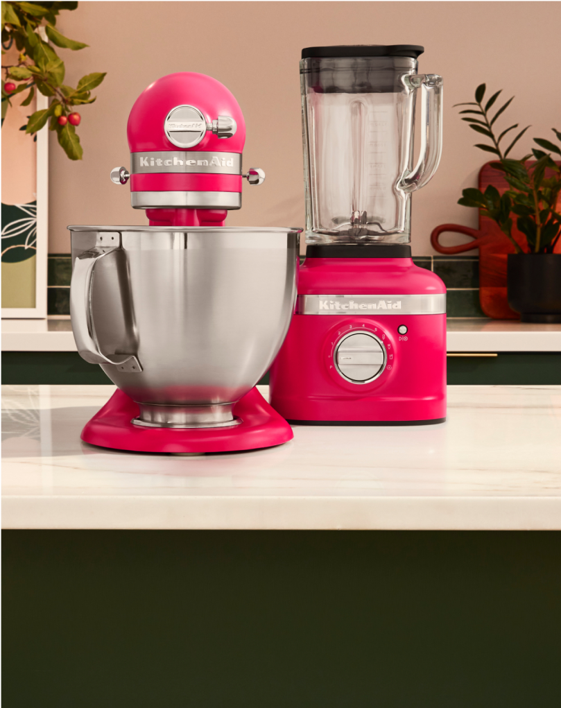 A KitchenAi® Stand Mixer in Hibiscus.