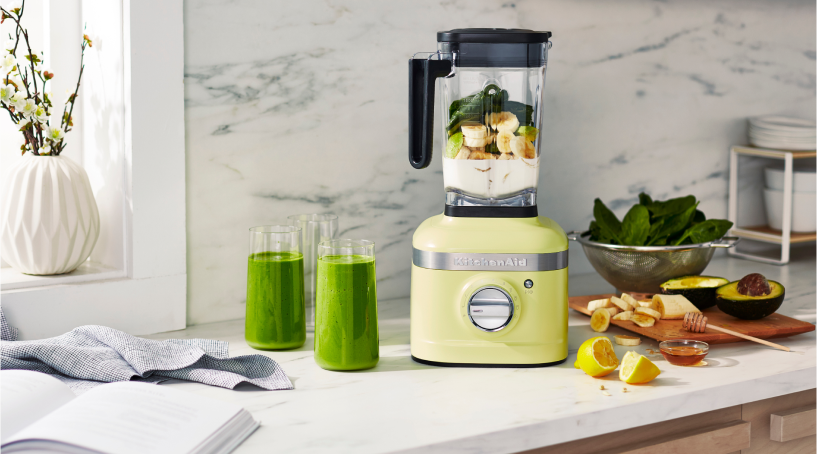 A KitchenAid® Blender in Kyoto Glow in a white kitchen.