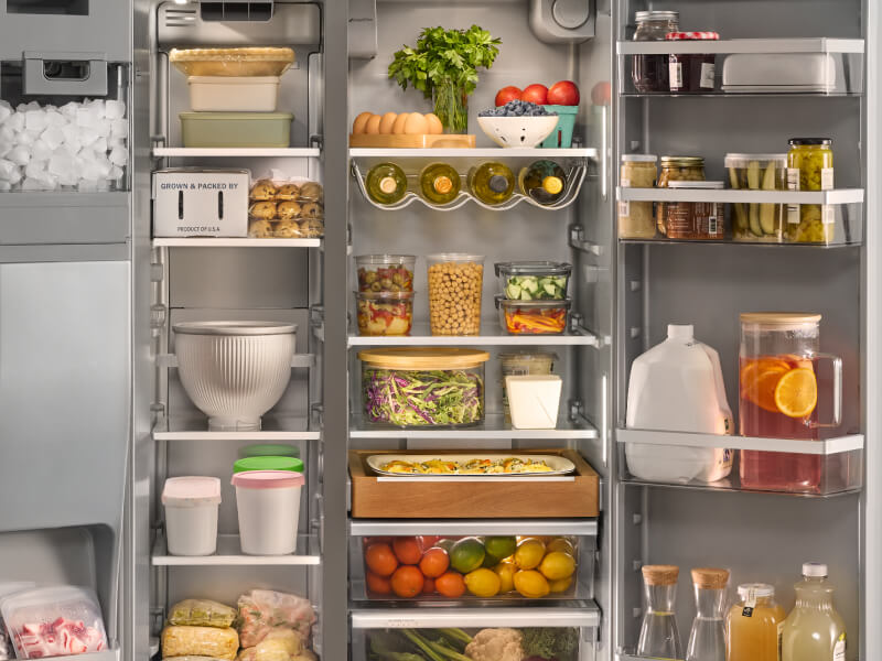 A closeup of a very organized refrigerator