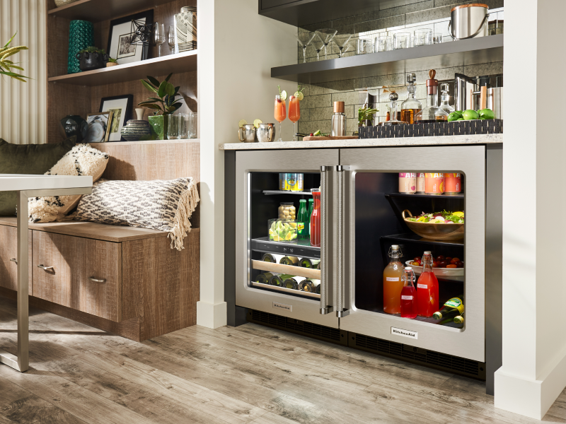 Undercounter refrigerator and beverage center beneath a countertop bar Undercounter refrigerator and beverage center beneath a countertop bar