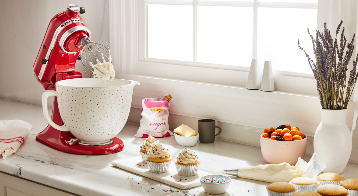 KitchenAid® Stand Mixer with a decorative bowl mixing frosting KitchenAid® Stand Mixer with a decorative bowl mixing frosting