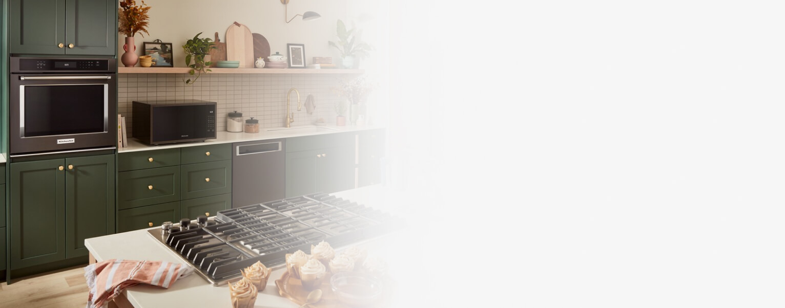 KitchenAid® major appliances in a green kitchen